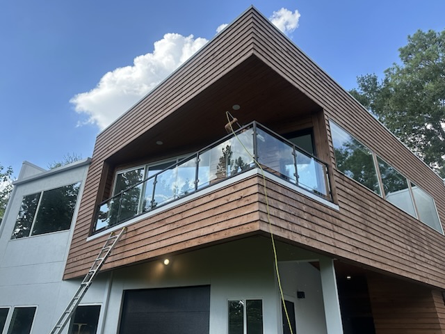 Glass balcony railing at a modern home