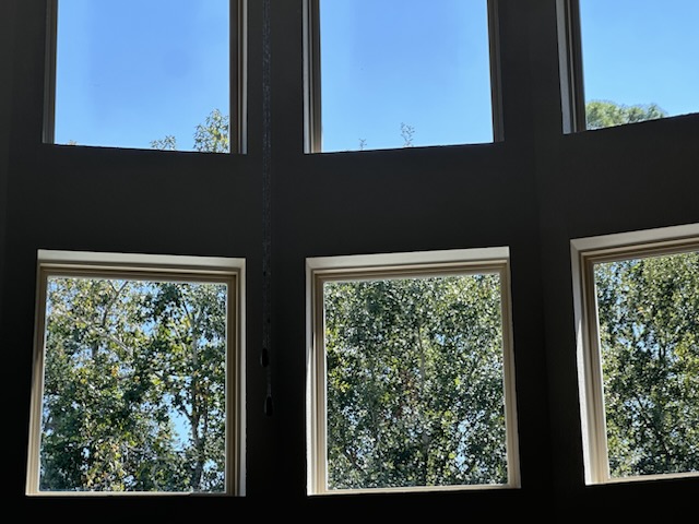 High interior windows and upper-story glass